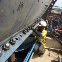 CHECKING MILL SHELL BOLTS.