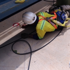 CHECKING THE CETRE LINE OF A BASE PLATE WITH A PLUMB BULD