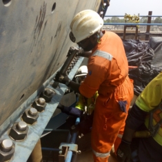 FIXING A FITTED STUD INTO A SHELL TO SHELL FLANGE JOINT