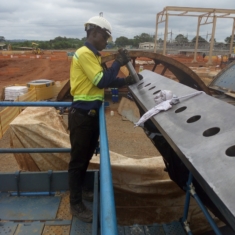 POLISHING THE FITTED STUD HOLE OF THE BOTTOM SECTION OF THE MILL SHELL SECTION