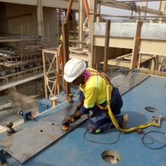 POLISHING THE TOP OF A MILL MOTOR BASE PLATE